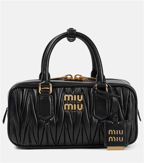 miu miu black handbag|farfetch handbags miu.